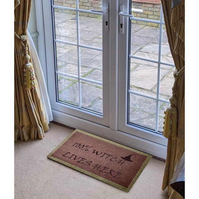 Yaretzi 100% Witch Lives Here W40 x L70 cm Indoor Door Mat Happy Larry on Productcaster.