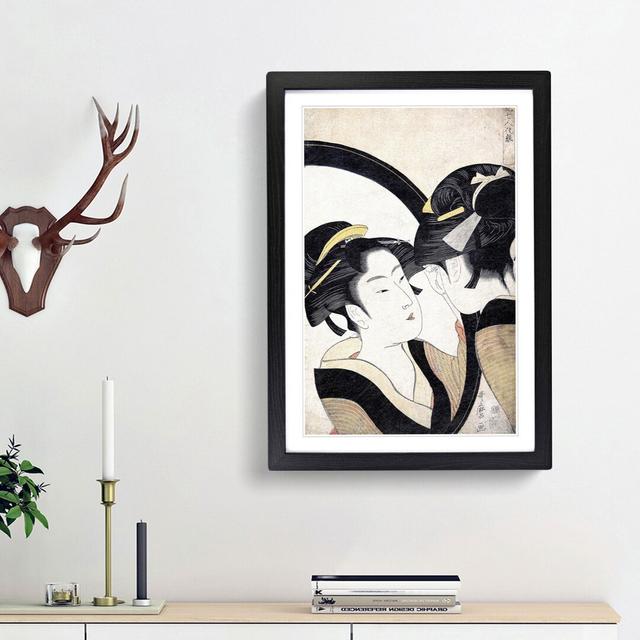 Girl Admiring Herself by Kitagawa Utamaro - Picture Frame Painting Print East Urban Home Size: 36cm H x 27cm W x 2cm D, Frame Option: Black Framed on Productcaster.