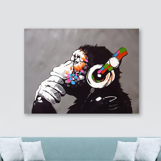 DJ Monkey by Banksy - Wrapped Canvas Art Print Happy Larry Size: 20.5cm H x 30.5cm W on Productcaster.