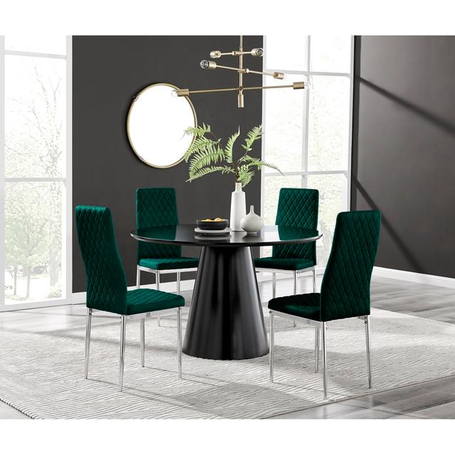 Edzard Statement Pedestal Round Dining Table Set & 4 Luxury Velvet Dining Chairs Furniture Box Chair Colour: Green/Silver, Table Colour: Black on Productcaster.