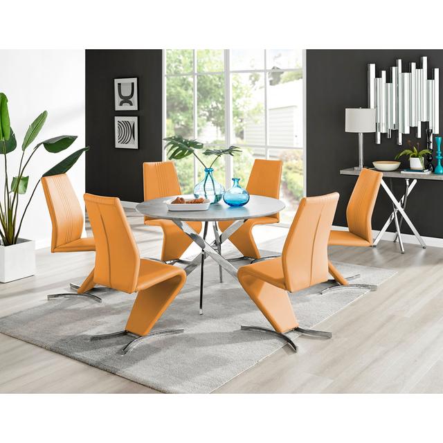 Tierra Modern Chrome Metal & Glass Round Dining Table Set with 6 Modern Design Faux Leather Chairs Canora Grey on Productcaster.