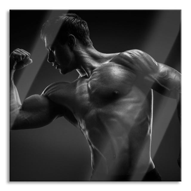 Glasbild Posierender Bodybuilder Brayden Studio Größe: 70 cm H x 70 cm B x 0,4 cm T on Productcaster.