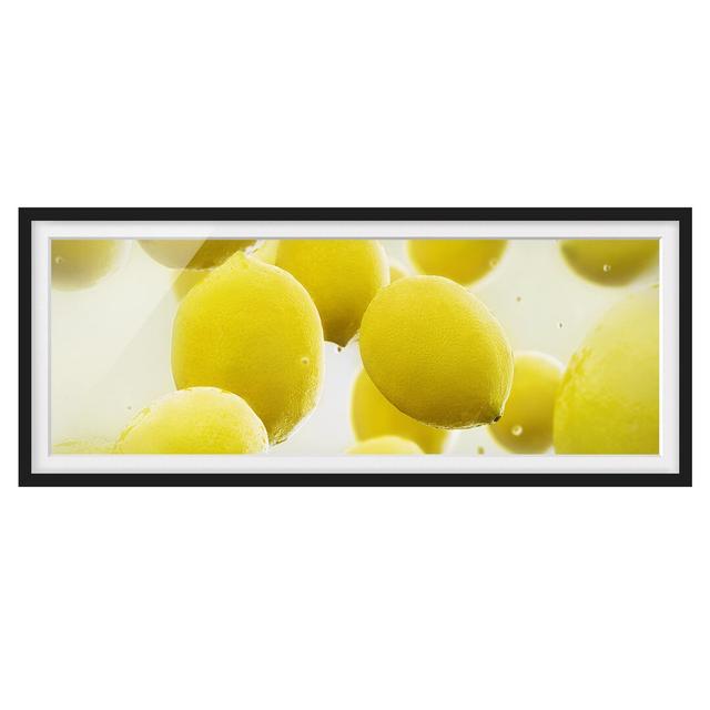 Lemons in Water - Picture Frame Graphic Art Ebern Designs Size: 40cm H x 100cm W x 2cm D, Frame Option: Black Framed on Productcaster.