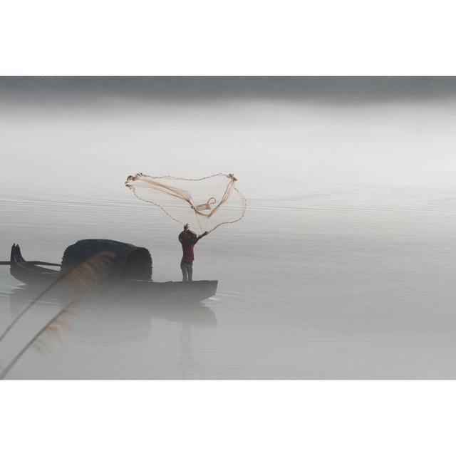 Fisherman Casting Net on River - Wrapped Canvas Photograph Breakwater Bay Size: 81cm H x 122cm W x 3.8cm D on Productcaster.