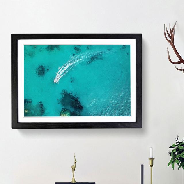 Boat Passing over the Ocean in Corfu Greece - Picture Frame Graphic Art Print East Urban Home Size: 36cm H x 48cm W x 2cm D, Frame Option: Black Frame on Productcaster.