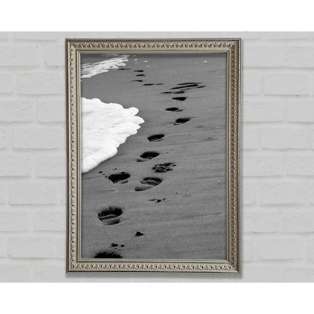 Gerahmtes Poster Footprints In The Ocean Sand B N W Bright Star Größe: 29,7 cm H x 21 cm B on Productcaster.