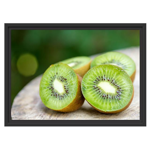 Gerahmtes Wandbild Leckere aufgeschnittene Kiwis East Urban Home Größe: 40 cm H x 55 cm B on Productcaster.