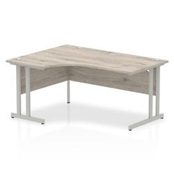 Impulse 1600mm Left Crescent Desk Grey Oak Top Silver Cantilever Leg on Productcaster.