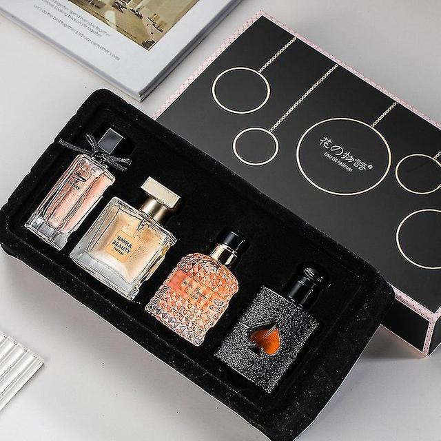 Flower Story Women's Perfume Set Eau De Liberty Black Opium Reversed Paris Perfume Three-piece Set Huayi four-piece set 100ML on Productcaster.