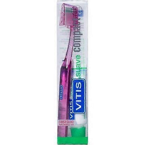 Vitis compact soft toothbrush with aloe for gentle oral care on Productcaster.