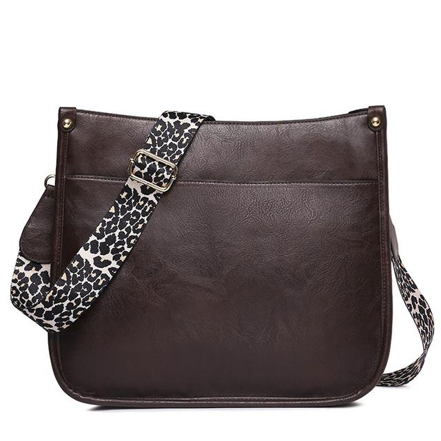 Leopard Guitar Strap Crossbody Bucket Purse - Pelle vegana, design resistente, chic ed elegante - Dimensioni perfette per l'essenziale di tutti i g... on Productcaster.