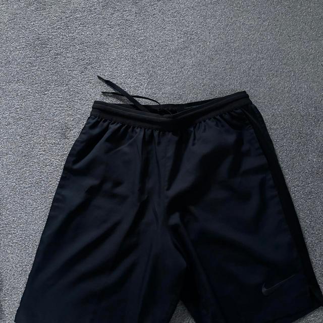 Nike Men's Shorts - Black - M on Productcaster.