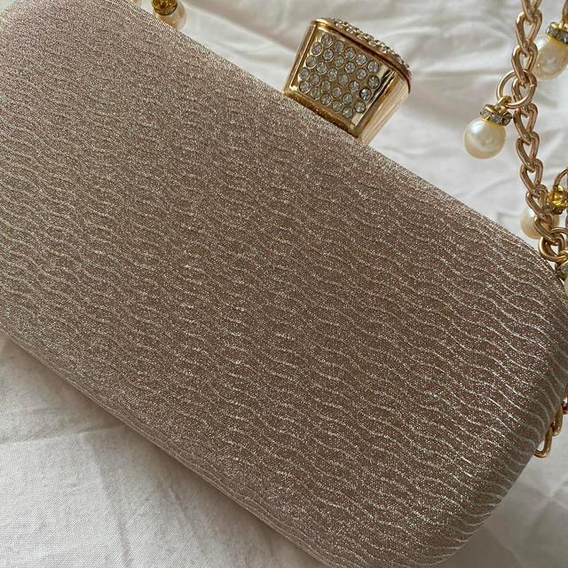 The Unbranded Brand Women's Clutch bags - Gold on Productcaster.