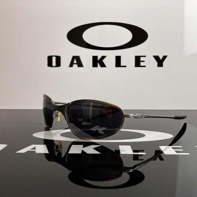 Oakley Men's Round Sunglasses - Grey/Black on Productcaster.