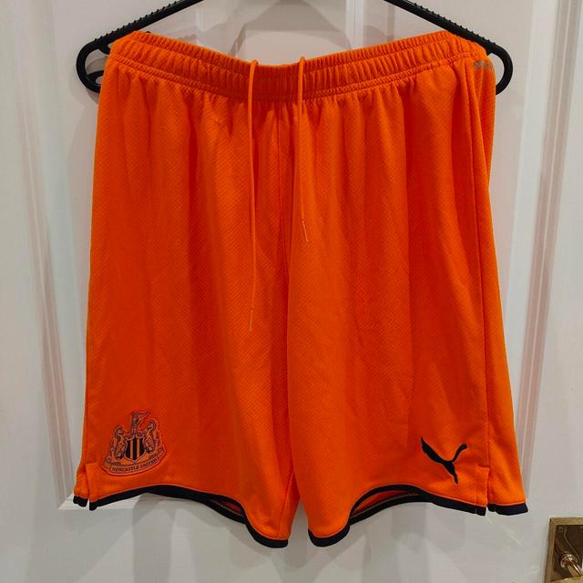 Newcastle United F.C. Men's Shorts - Orange - M on Productcaster.