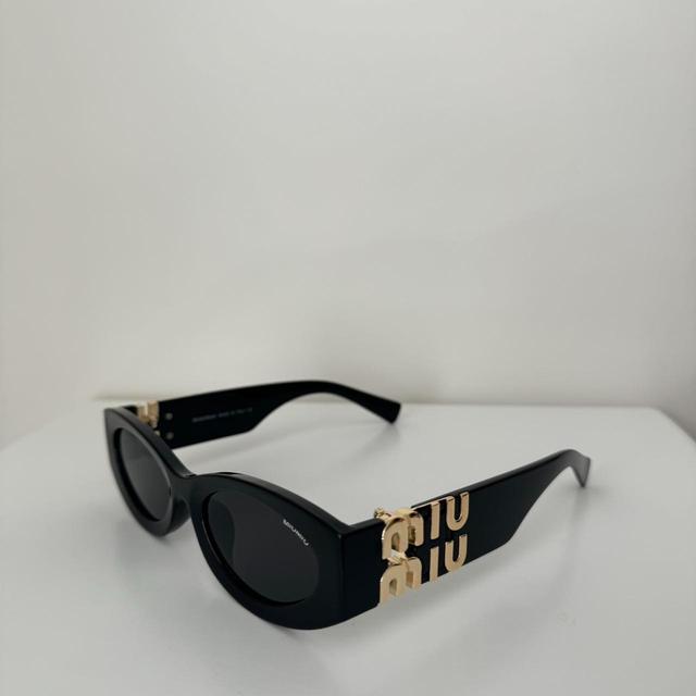 Miu Miu Women's Sunglasses - Black on Productcaster.