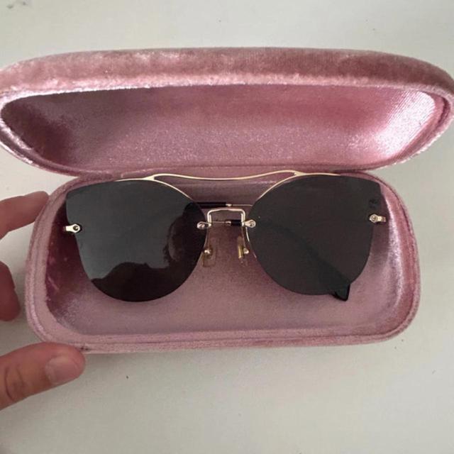 Miu Miu Women's Sunglasses - Black/Gold on Productcaster.