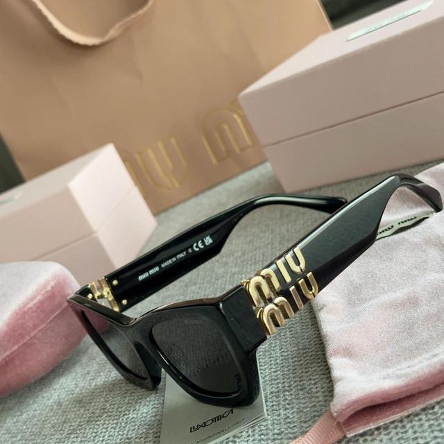 Miu Miu Women's Sunglasses - Black/Grey on Productcaster.