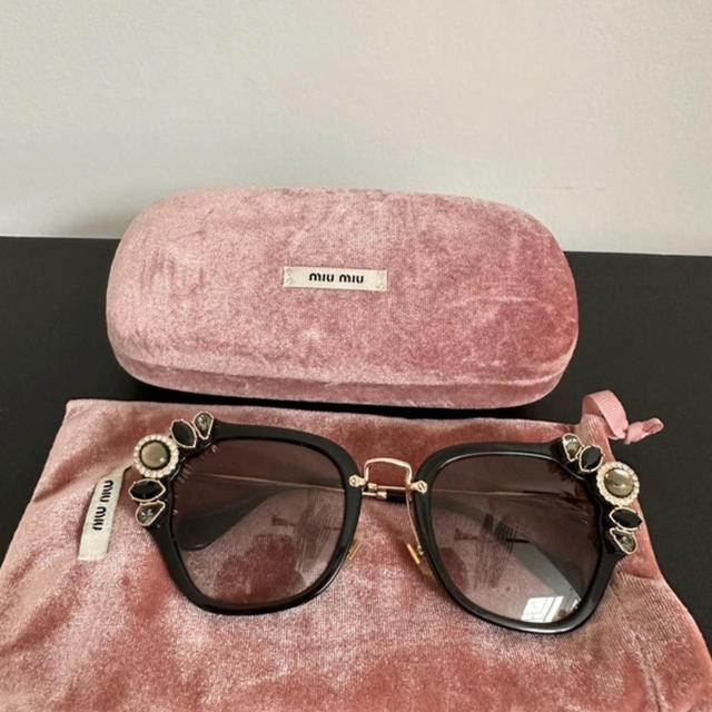 Miu Miu Women's Sunglasses - Black/Brown on Productcaster.