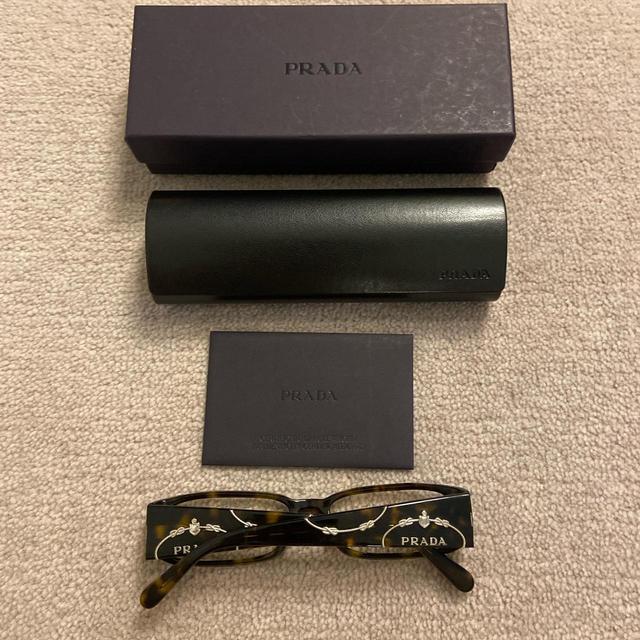 Prada Women's Cat eye Sunglasses - Brown/Silver on Productcaster.