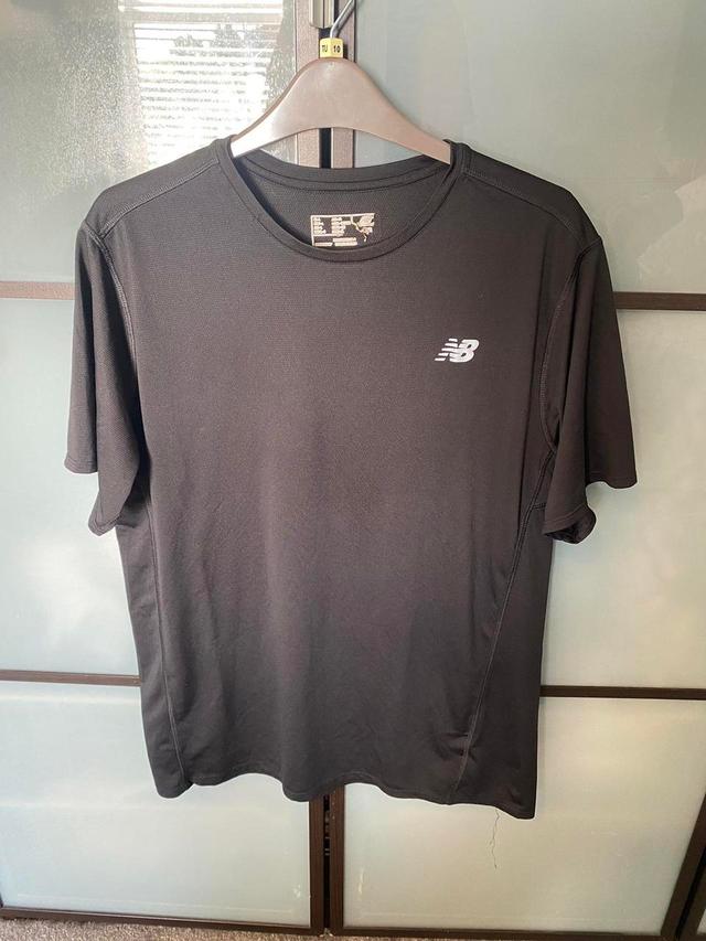 New Balance Men's T-shirt - Black - L on Productcaster.