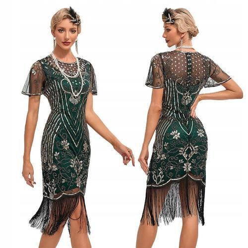 Une Superbe Robe De Bal Rétro Avec Des Broderies Et Des Franges Com... on Productcaster.