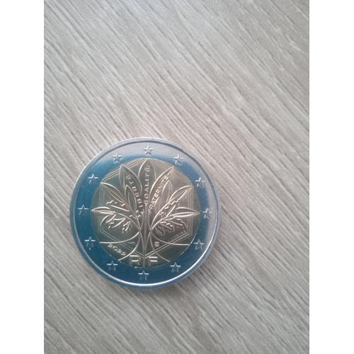 Pièce 2 Euros Rare, Arbre De Vie En État Quasi Neuf on Productcaster.