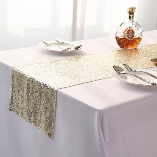 Chemin de table "nappe à paillettes dorées" 100x150cmcouleur crème on Productcaster.