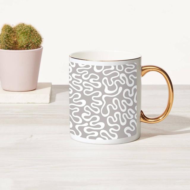 Squiggles Bone China Gold Handle Mug on Productcaster.