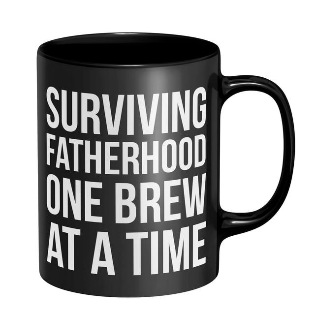 Surviving Fatherhood One Brew At A Time Mug - Black Schwarz on Productcaster.