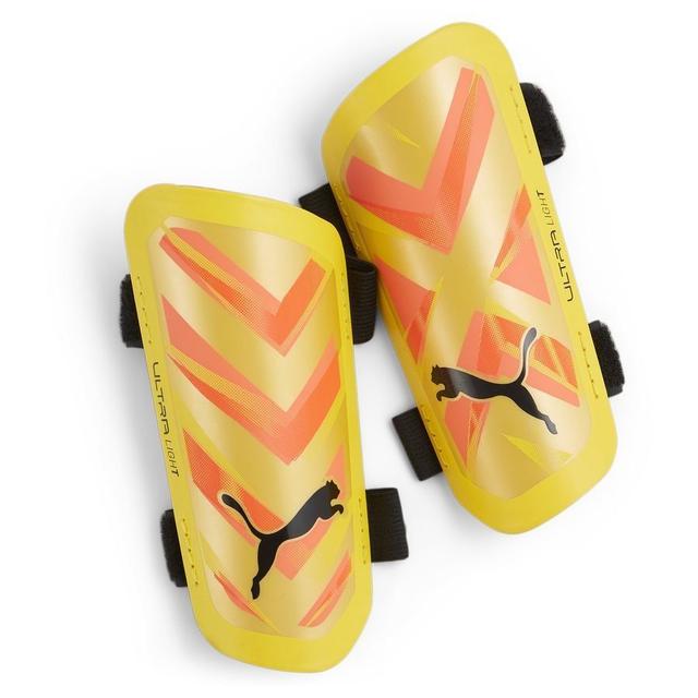 PUMA Shin Pads Ultra Light Strap Forever Faster - Sun Stream/sunset Glow/PUMA Black, size ['Large'] on Productcaster.