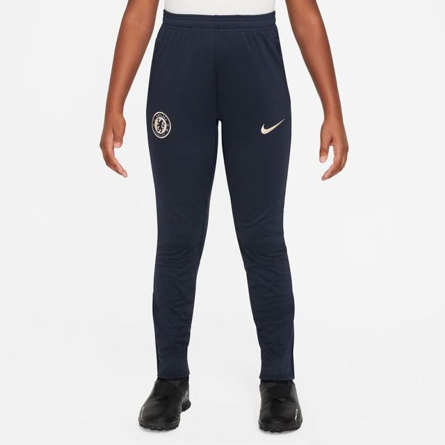 Chelsea Training Trousers Dri-fit Strike - Obsidian/photo Blue/guava Ice Kids - Nike, size XS: 122-128 cm on Productcaster.