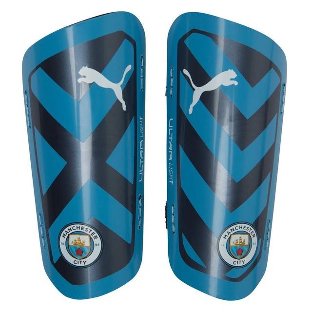 Manchester City Shin Pads Ultra Light Strap - Team Light Blue/white - PUMA, size Large on Productcaster.