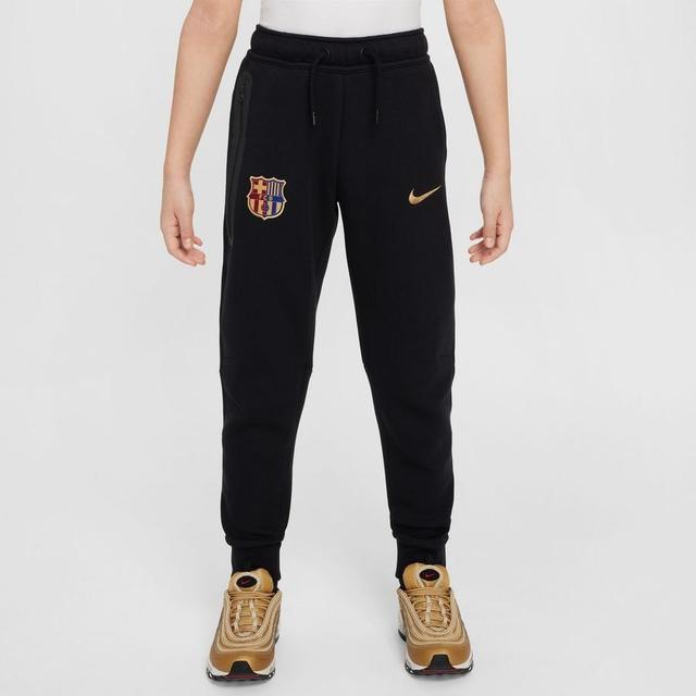 Barcelona Sweatpants Nsw Tech Fleece - Black/club Gold Kids - Nike, size S: 128-137 cm on Productcaster.