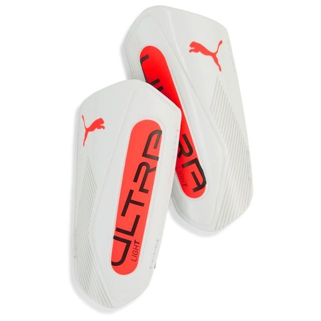 PUMA Scheenbeschermers Ultra Light Strap Unlimited - Wit/glowing Red, maat Medium on Productcaster.