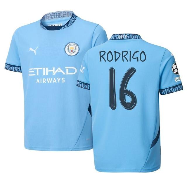 Manchester City Home Shirt 2024/25 RODRIGO 16 + Champions League & UEFA Foundation Sleeve Patch Kids - PUMA, size XL/176 cm on Productcaster.