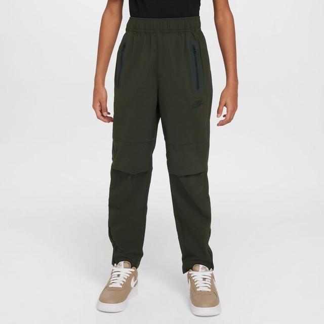 Nike Sweatpants Nsw Tech Woven - Sequoia/black Kids, size XS: 122-128 cm on Productcaster.