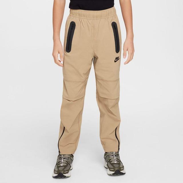 Nike Sweatpants Nsw Tech Woven - Beige/black Kids, size S: 128-137 cm on Productcaster.