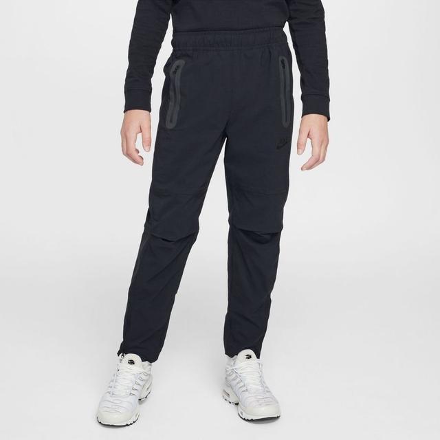 Nike Sweatpants Nsw Tech Woven - Black Kids, size S: 128-137 cm on Productcaster.