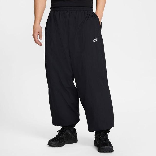 Nike Track Pants Club Woven Oversized - Black/white, size Large on Productcaster.