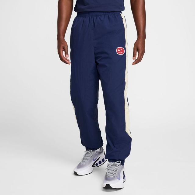 Nike Air Pants Nsw Woven - Midnight Navy/khaki/white, size Medium on Productcaster.