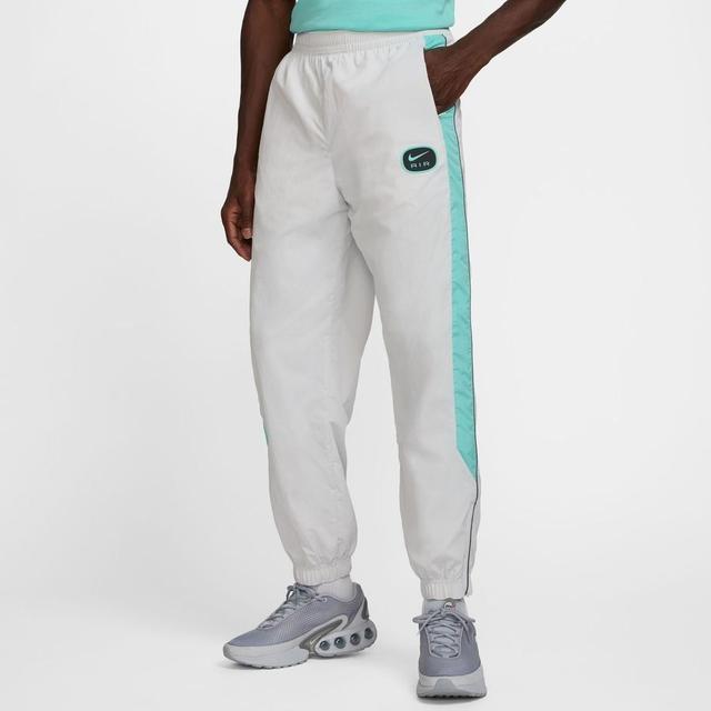 Nike Air Pants Nsw Woven - Photon Dust/tropical Twist/iron Grey, size XX-Large on Productcaster.