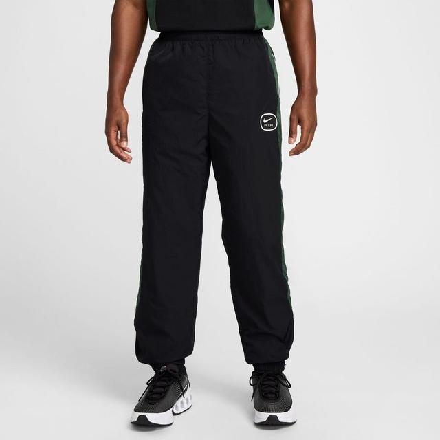 Nike Air Pants Nsw Woven - Black/green/white, size Small on Productcaster.